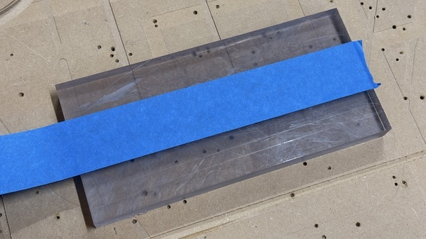 Apply the painters tape to the stock